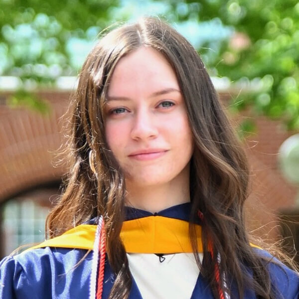Headshot of Elisa Torres-Yeckley